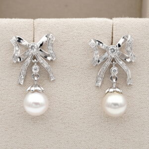 Bow Earrings .60 Ct Diamond 8 mm. Cultured Sea Pearl 18 KT Gold