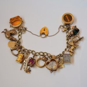 Vintage 16 Charm Bracelet 9ct solid gold English hallmarked – Sold!